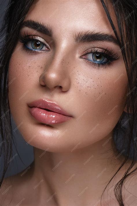 Premium Photo Beautiful Girl With Bright Fashionable Makeup Freckles And Blue Eyes Beauty Face