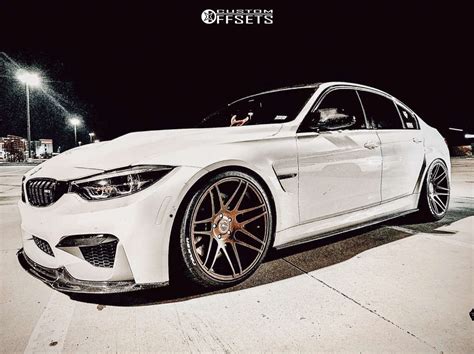 2018 bmw m3 with 20x9 5 23 forgestar f14 and 265 30r20 falken azenis fk450 and lowering springs