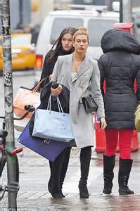 Hailey Baldwin Keeps It Casual In An Oversized Grey Coat As She Enjoys A Spot Of Retail Therapy