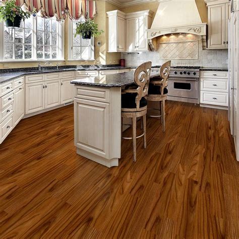 Trafficmaster laminate flooring is inexpensive and recommended for those that want to try their hand at flooring a room the easy way. TrafficMaster Teak 6 in. W x 36 in. L Luxury Vinyl Plank ...