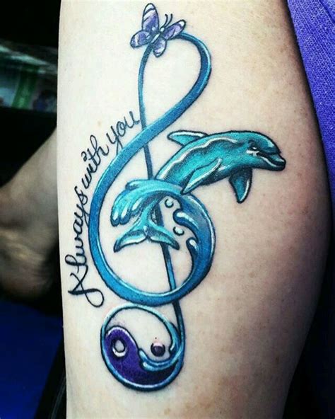 delve into the beauty of dolphin tattoos explore 40 mesmerizing designs for men