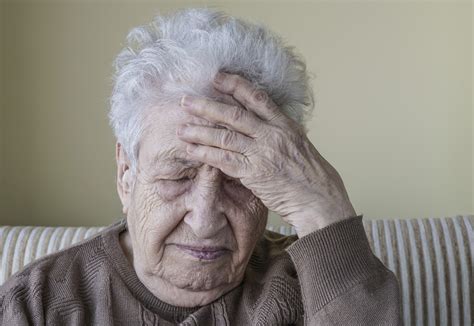 Ill Senior Woman Has Headache Rehab First