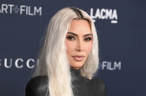 kim kardashian debuted a darker honey blonde hair color months after first dyeing her hair