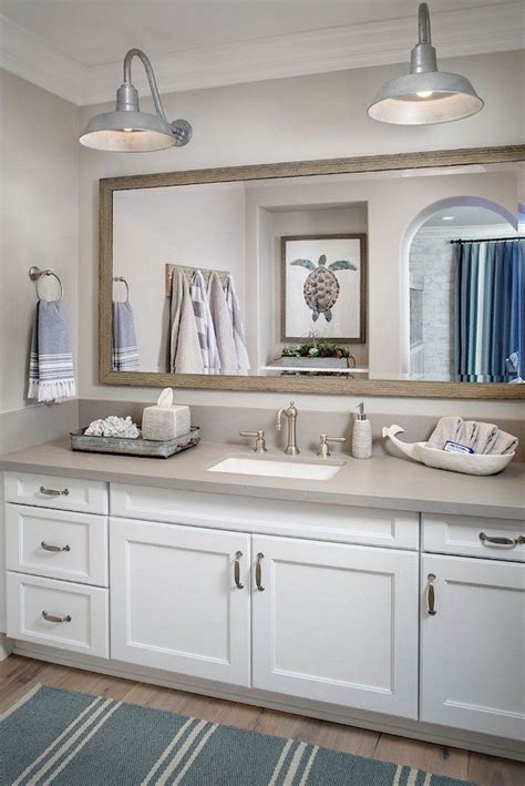 Think about if you prefer to include pops of unconventional, but summery colors like coral or pink. 34+ Amazing Coastal Style Nautical Bathroom Designs Ideas ...