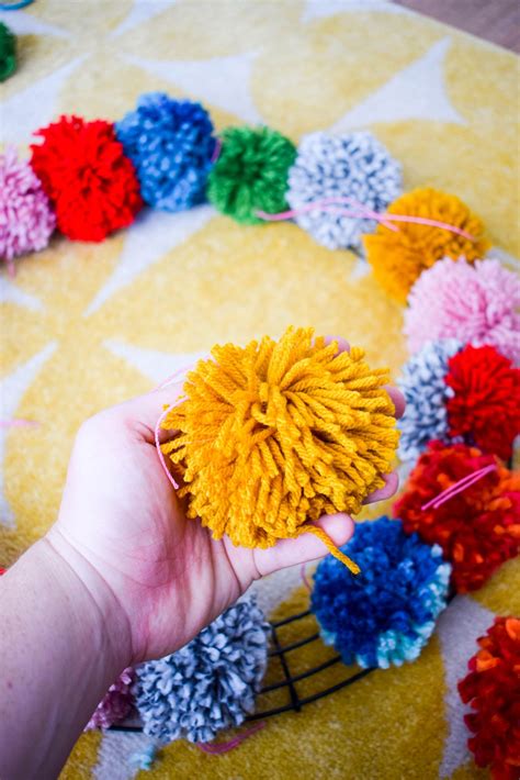 Make Your Own Pom Pom Wreath This Holiday Season And Add A Bold