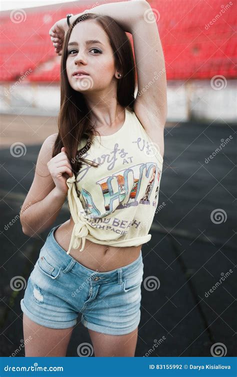 Girl Having Fun Outdoor Pretty Girl Sitting At School Stadium Stock