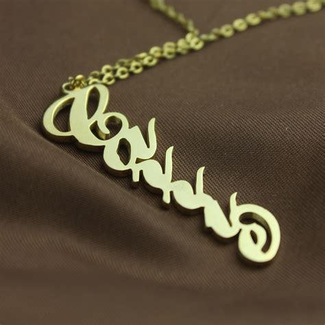 solid gold personalized vertical carrie style name necklace