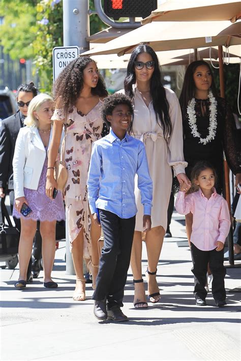 Kimora Lee Simmons Stuns In A Beige Dress For Lunch With Her Kids At Il