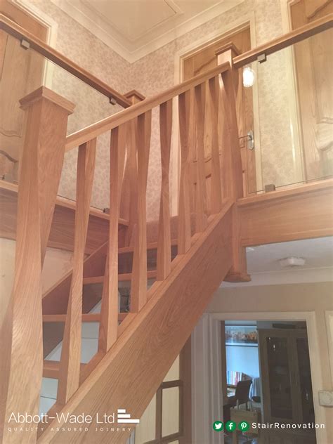 Open Tread Stairs With Glass Down Stands And Twisted Oak Newel Posts