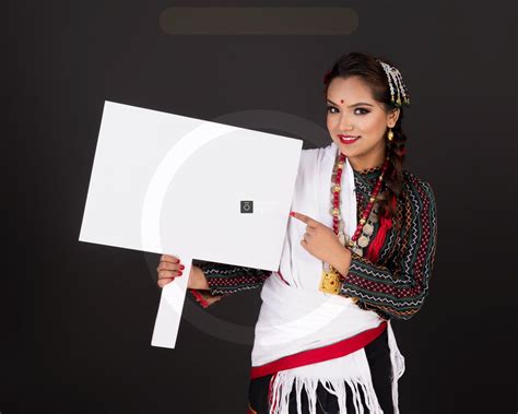 newari maicha in haku patasi dress poses with playcard photos nepal