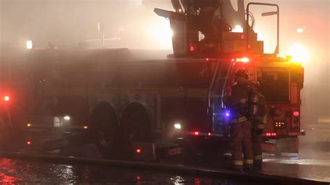 Firefighters Battling Blaze At Night 2 Stock Footage SBV-347581267
