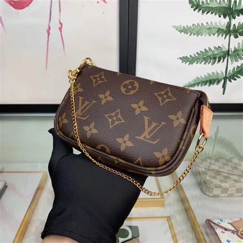 Louis Vuitton Lv Women Mini Pochette Accessoires In Monogram Canvas Lulux