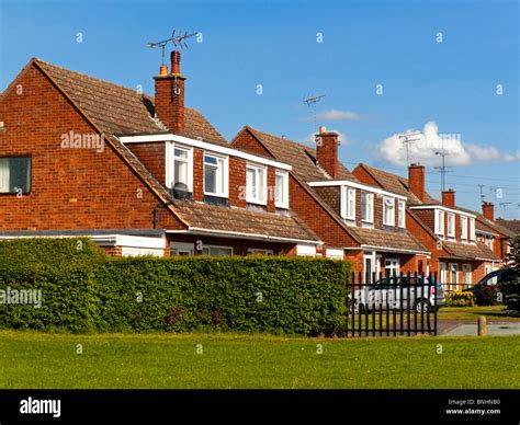 Suburban Housing In The Uk With 1970s Style Houses With Pitched Roofs