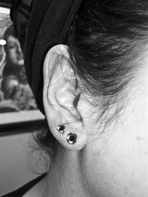 Pair Of Gauged Earlobes Done At Adrenaline Vancity Tattoos And