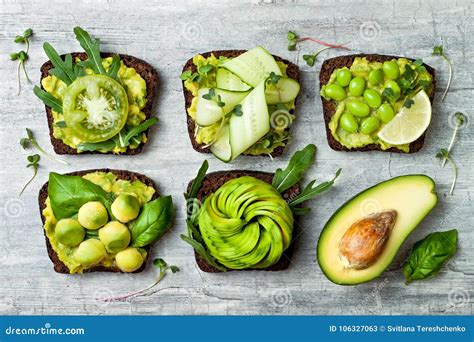 Fresh Avocado Toasts With Different Toppings Healthy Vegetarian
