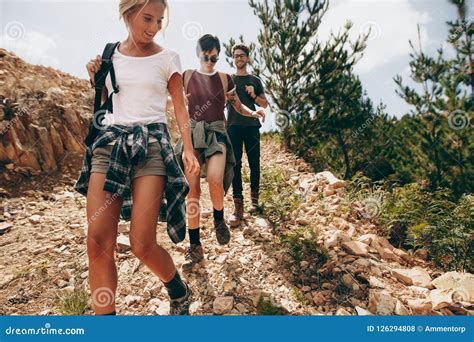 Friends On A Vacation Hiking In A Forest Stock Photo Image Of