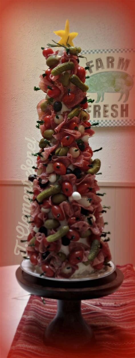 I've advocated for christmas day pizza for years, only to be told it's not festive enough. Antipasto Christmas Tree, so pretty and super easy to make ...