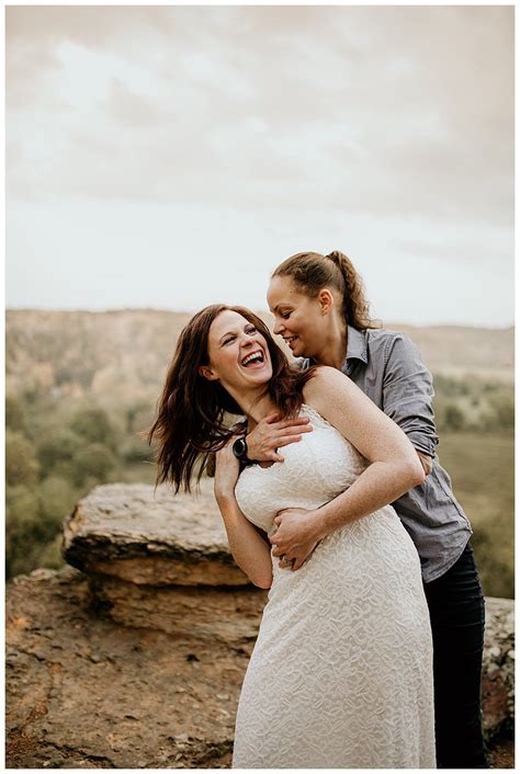 Kissing On Cliffs And Waterfall Frolics In This Epic Engagement Shoot