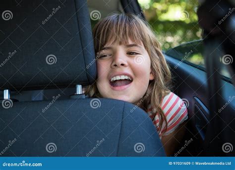Teenage Girl Sitting In The Back Seat Of Car Stock Image Image Of