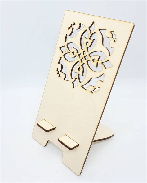 Wood Phone Stand With An Abstract Pattern Engraved Into It Will Hold Most Standard Size Phones