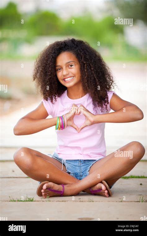 Young Happy Smiling African American Black Teen Girl With Afro Hair