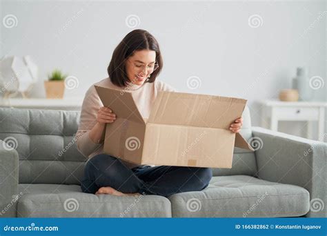 Woman Is Holding Cardboard Box Stock Photo Image Of Optimistic Face