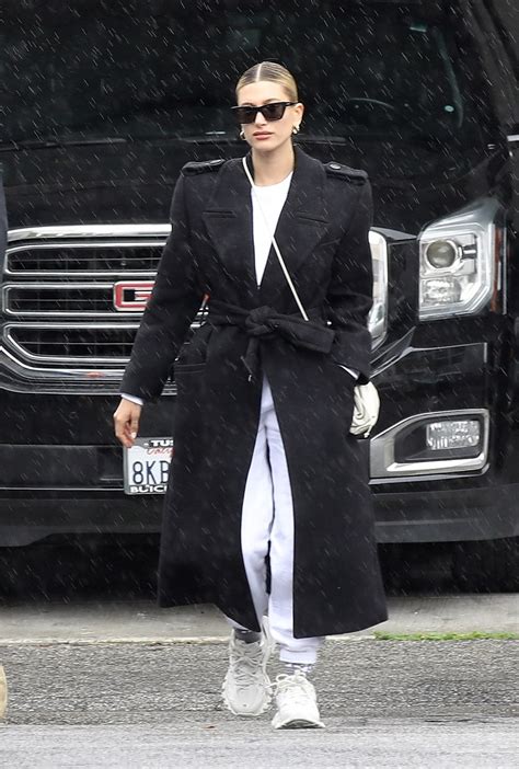 hailey baldwin black oversized double breasted trench coat street style autumn winter 2020