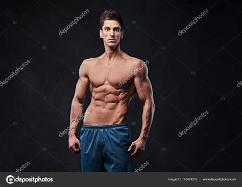 Studio Portrait Ectomorph Muscle Shirtless Male Dark Grey Background