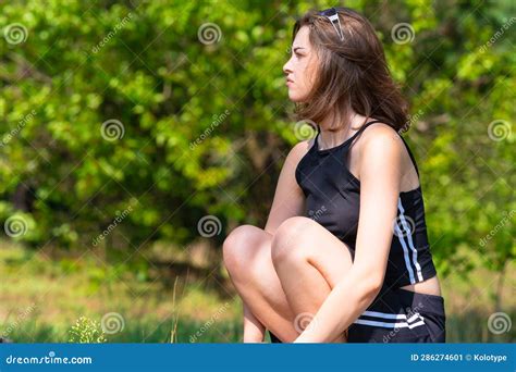 Girl Squatting Outdoors Stock Image Image Of Music