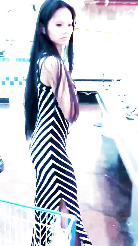 Sexy Filipino Babe In Long Striped Skirt Shopping For Meat Porn