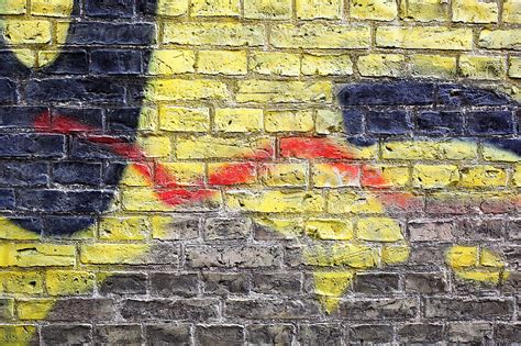 Graffiti On Brick Wall By Stocksy Contributor Marcel Stocksy