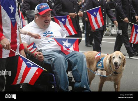 New York City Usa A Disable Man And His Dog At The Puerto Rican