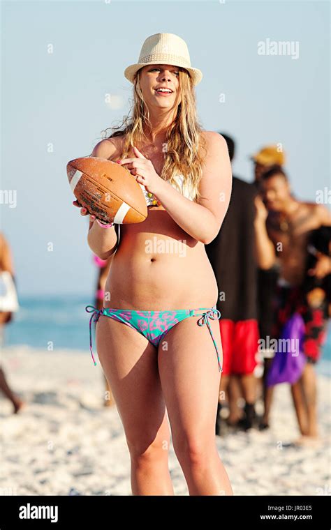 Woman In Bikini With Football At Panama City Beach During Spring Break