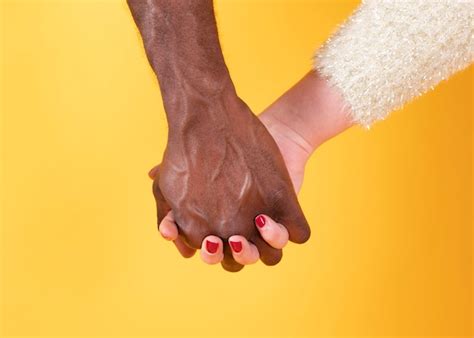 premium photo couple shaking hands interracial white woman and black man