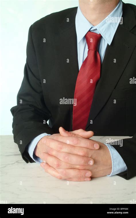 Man With Folded Hands Stock Photo Alamy