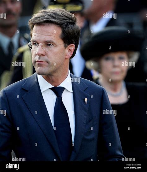 Queen Beatrix Of The Netherlands And Dutch Prime Minister Mark Rutte Attend The National