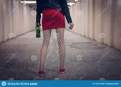 Sensual Woman In Stockings Holding Bottle Of Whiskey The Transition Of