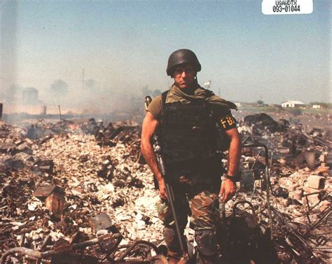 An Fbi Agent Poses Amidst The Ruins Of The Branch Davidian Compound In