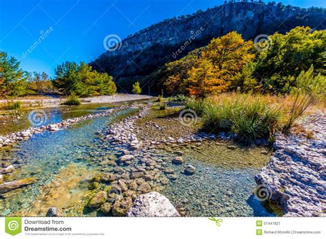 Bright Beautiful Fall Foliage On The Crystal Clear Frio River Stock