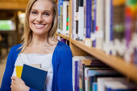 Smiling Female Student Holding A Book Stock Image Image Of School