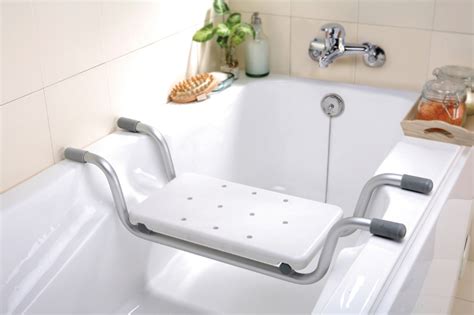 Bath tub rail provides stability getting in and out of the tub | great for elderly, seniors or after surgery. 6 Tips to Design A Bathroom For Elderly - InspirationSeek.com