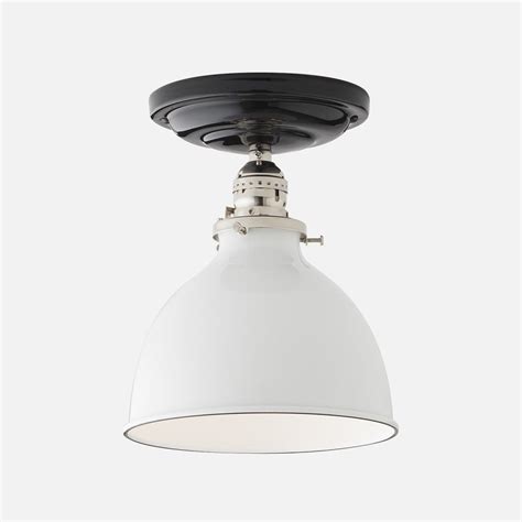 You may also need to tighten the screws into the mounting strap to tighten the fixture so that it sits flush with the ceiling. Defiance Surface Mount Light Fixture | Schoolhouse ...
