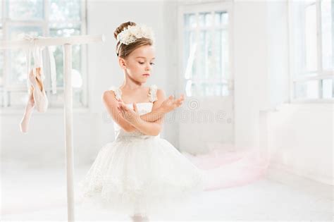 Little Ballerina Girl In A Tutu Adorable Child Dancing Classical