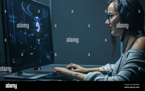 Shot Of The Beautiful Professional Gamer Girl Playing In First Person