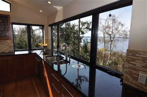 Since 1962, milgard windows & doors has designed and assembled superior, top quality windows and patio doors, backed with a full lifetime warranty. Ultra Series Black Bean Window frames were used through ...