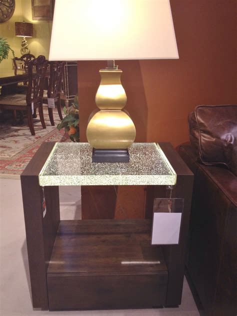 Maybe you would like to learn more about one of these? Artisan's "Best in Glass" nightstand featuring lit bubbled ...