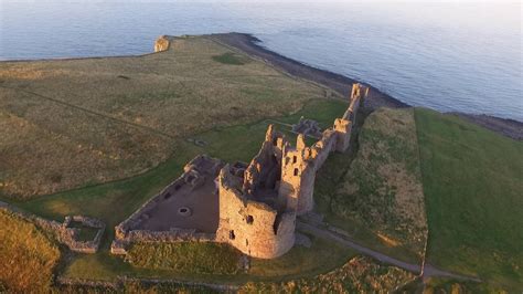 Craster And Dunstanburgh Castle From The Air Dji P3s Drone Youtube