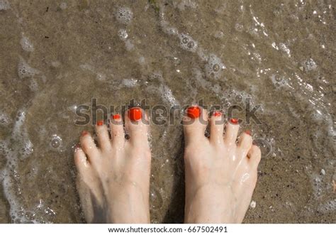 Beautiful Female Feet Bright Red Pedicure Stock Photo 667502491