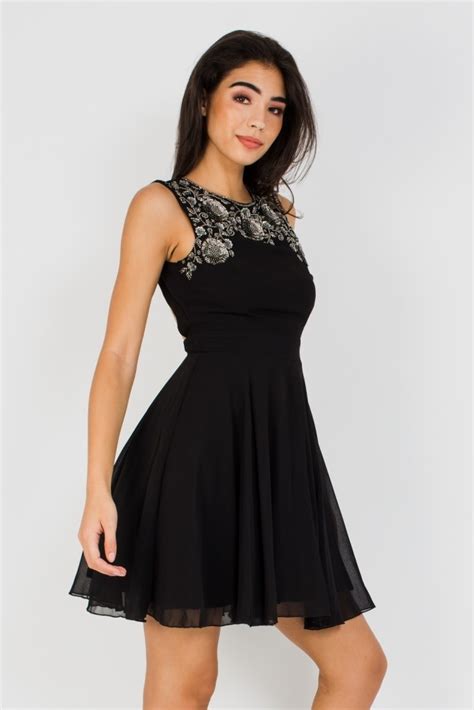 Mini dresses are still the perfect choice for a cocktail party, but the trend is quickly gathering speed. LACE & BEADS ASHA BLACK MINI DRESS | PARTY DRESSES