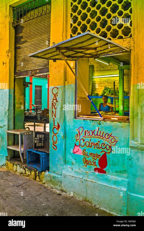 Colorful Yellow And Green Painted Shop Front Butchers Window Hi Res